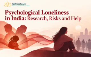 Person sitting alone at a crowded Indian family gathering — psychological loneliness